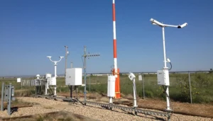 How do automatic weather stations differ from handheld weather stations?